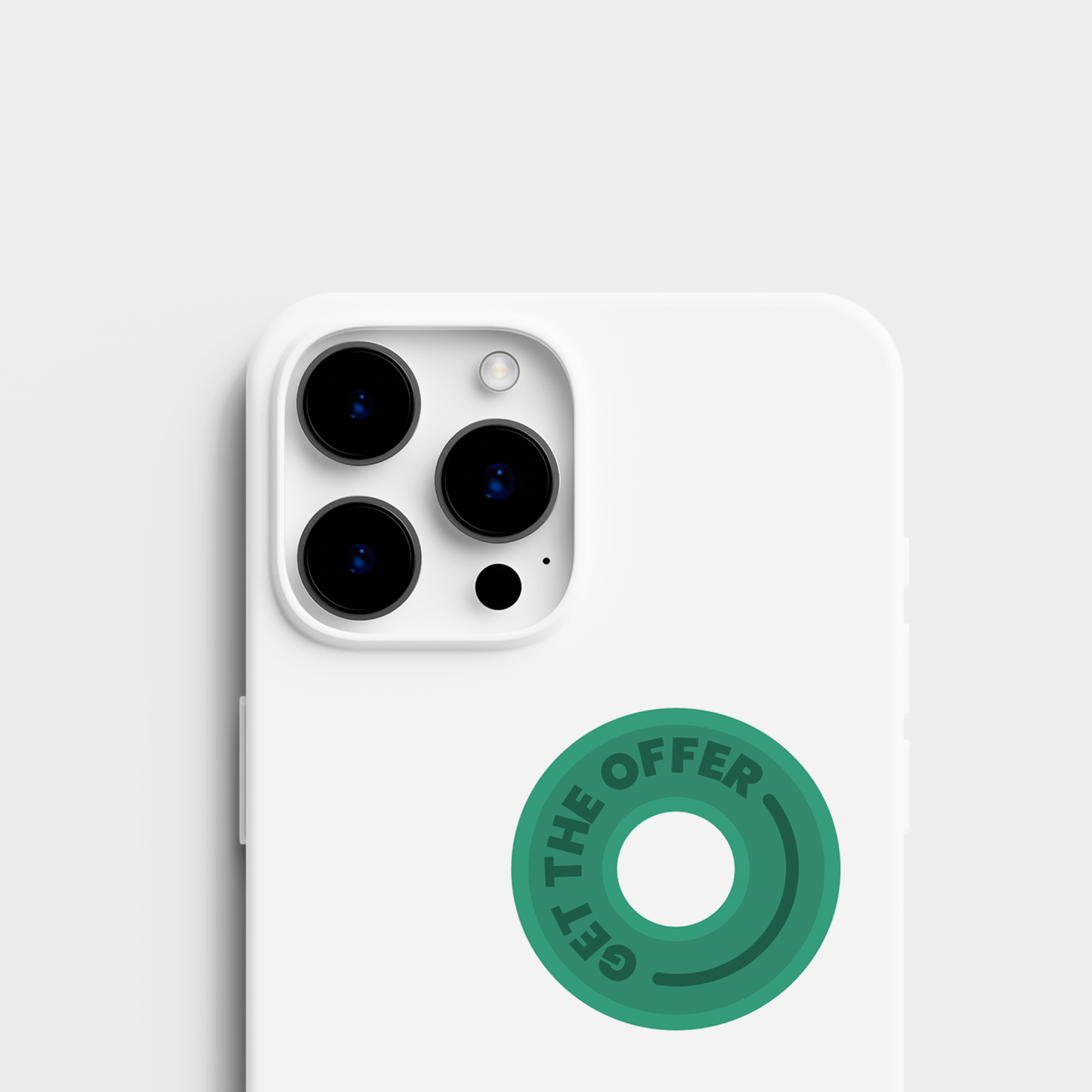 A top view of the sticker set alongside a sticker applied to an cell phone