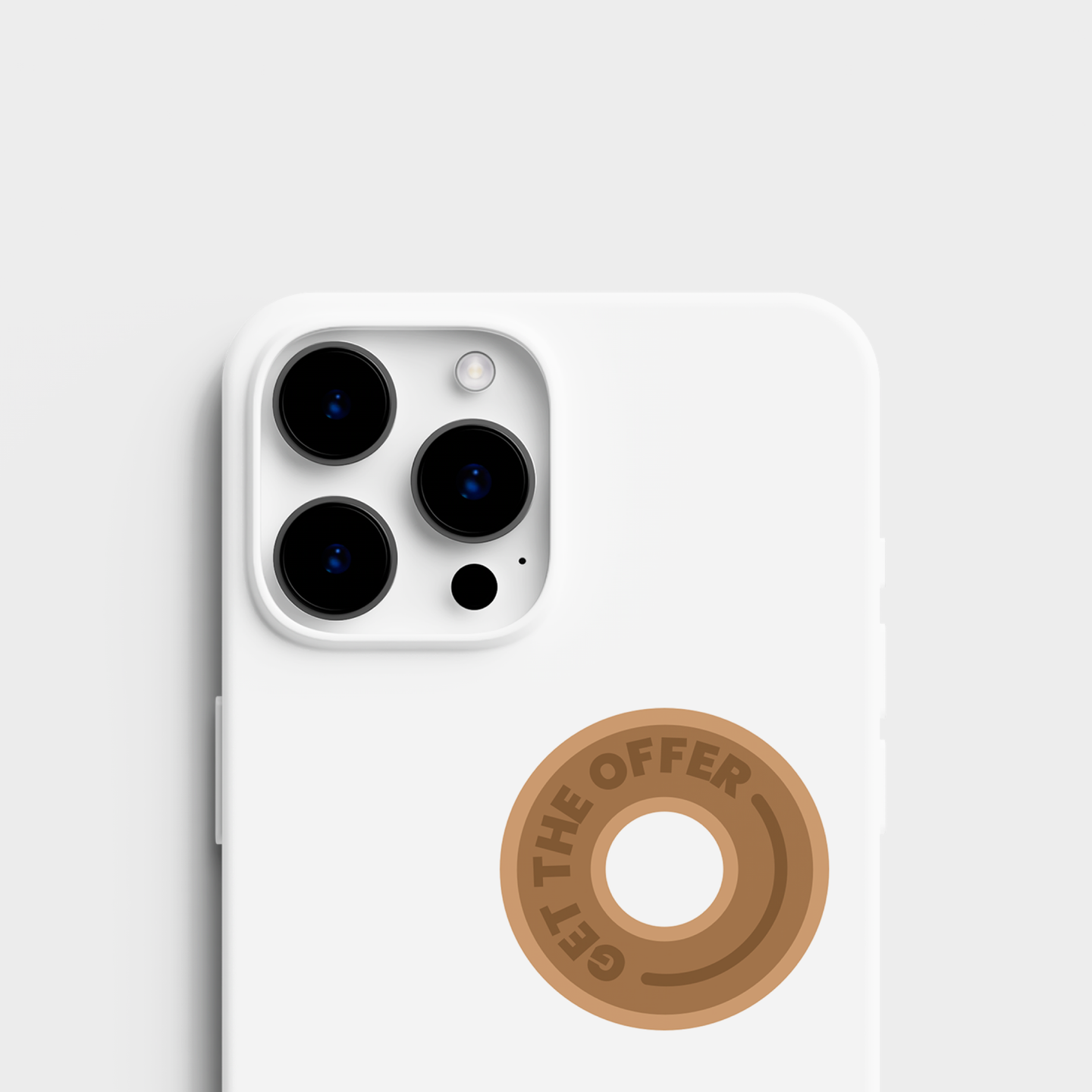 A top view of the sticker set alongside a sticker applied to an cell phone