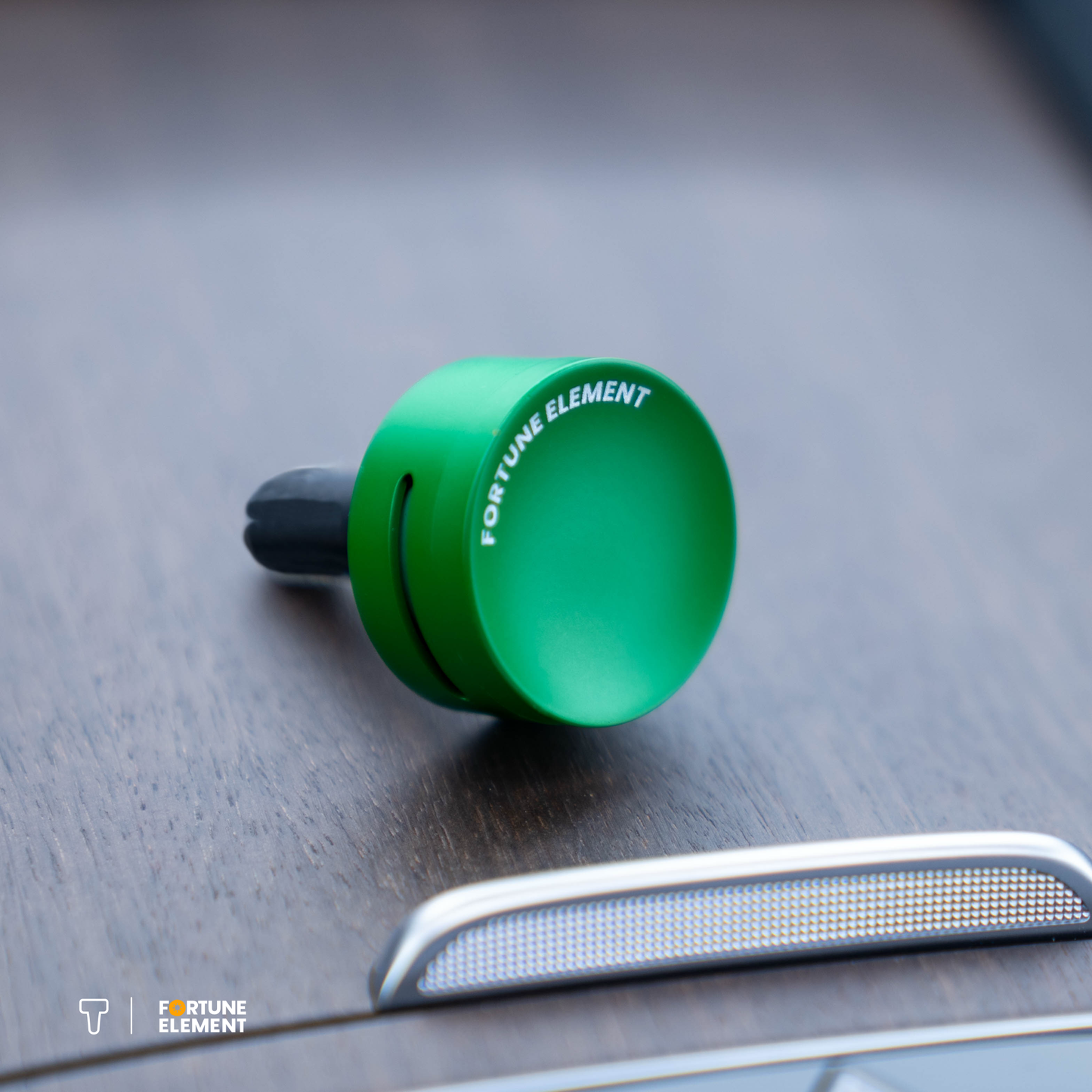 A close-up shot of the car diffuser resting on a wooden surface, showcasing its sleek design and elegant placement.