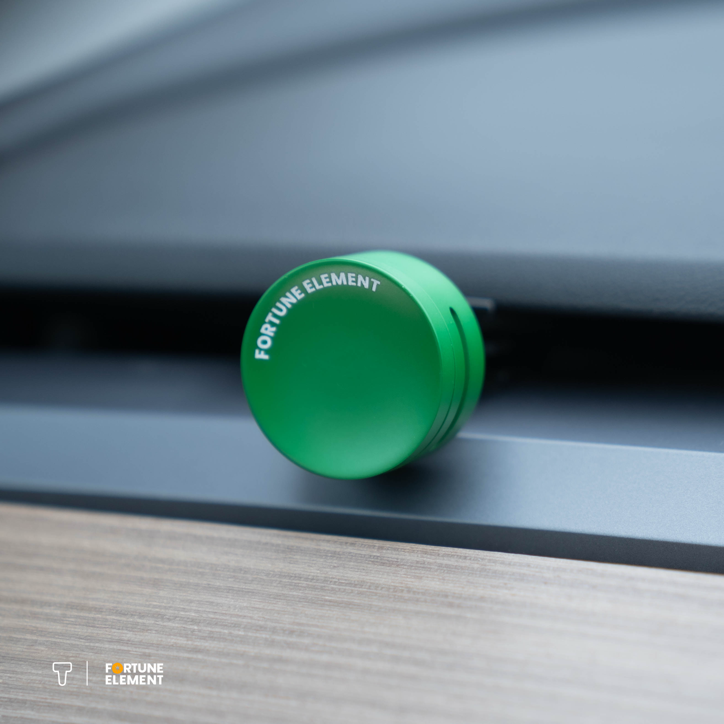 A close-up shot of the fortune element car diffuser clipped into the tesla vent, highlighting its secure attachment and integration with the vent design